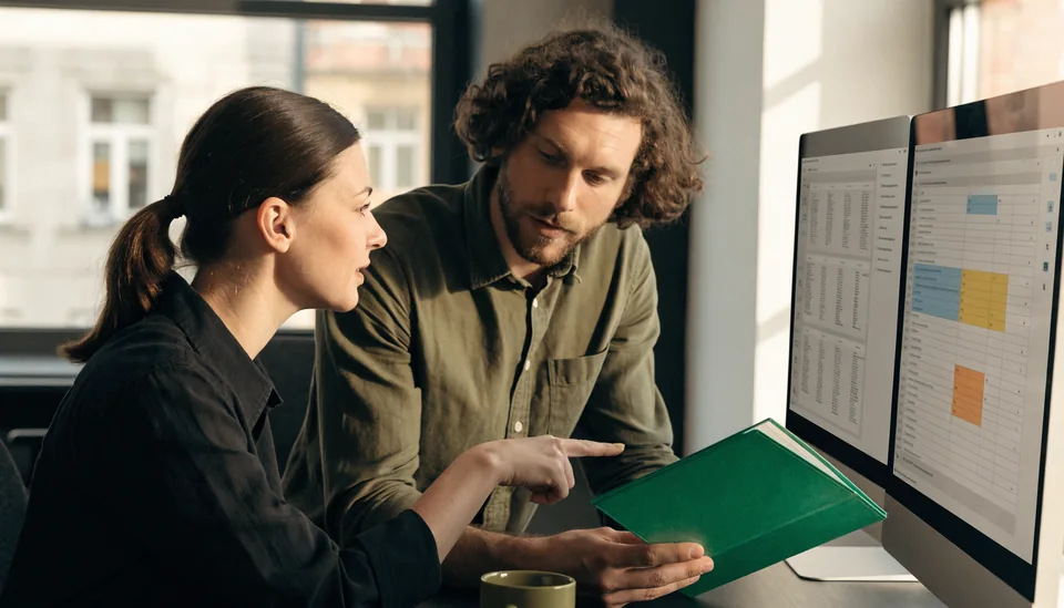 Illustrative scene of engineers reviewing document permissions for an enterprise AI assistant